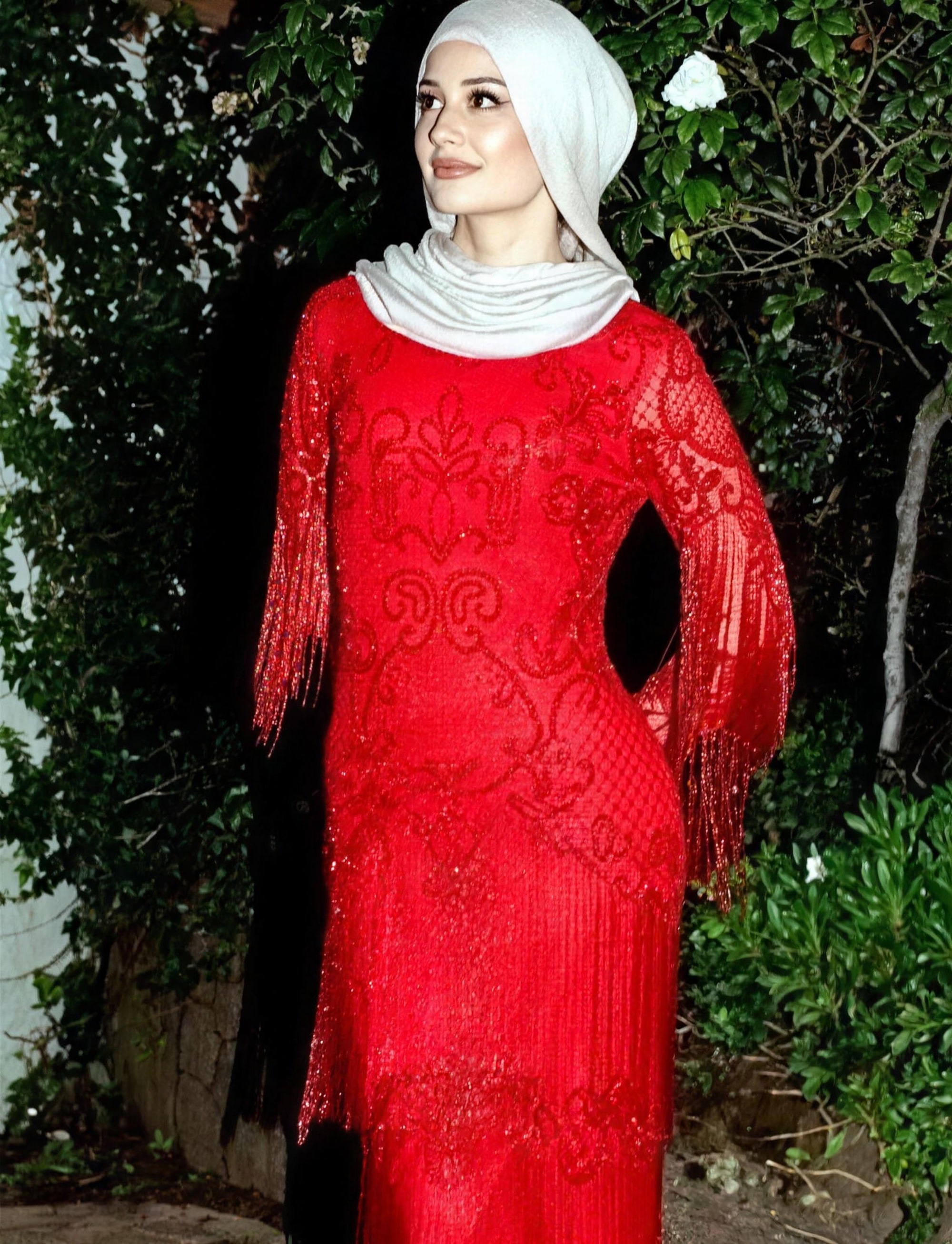 Deep-red beaded modest evening gown by RAIÉ Couture