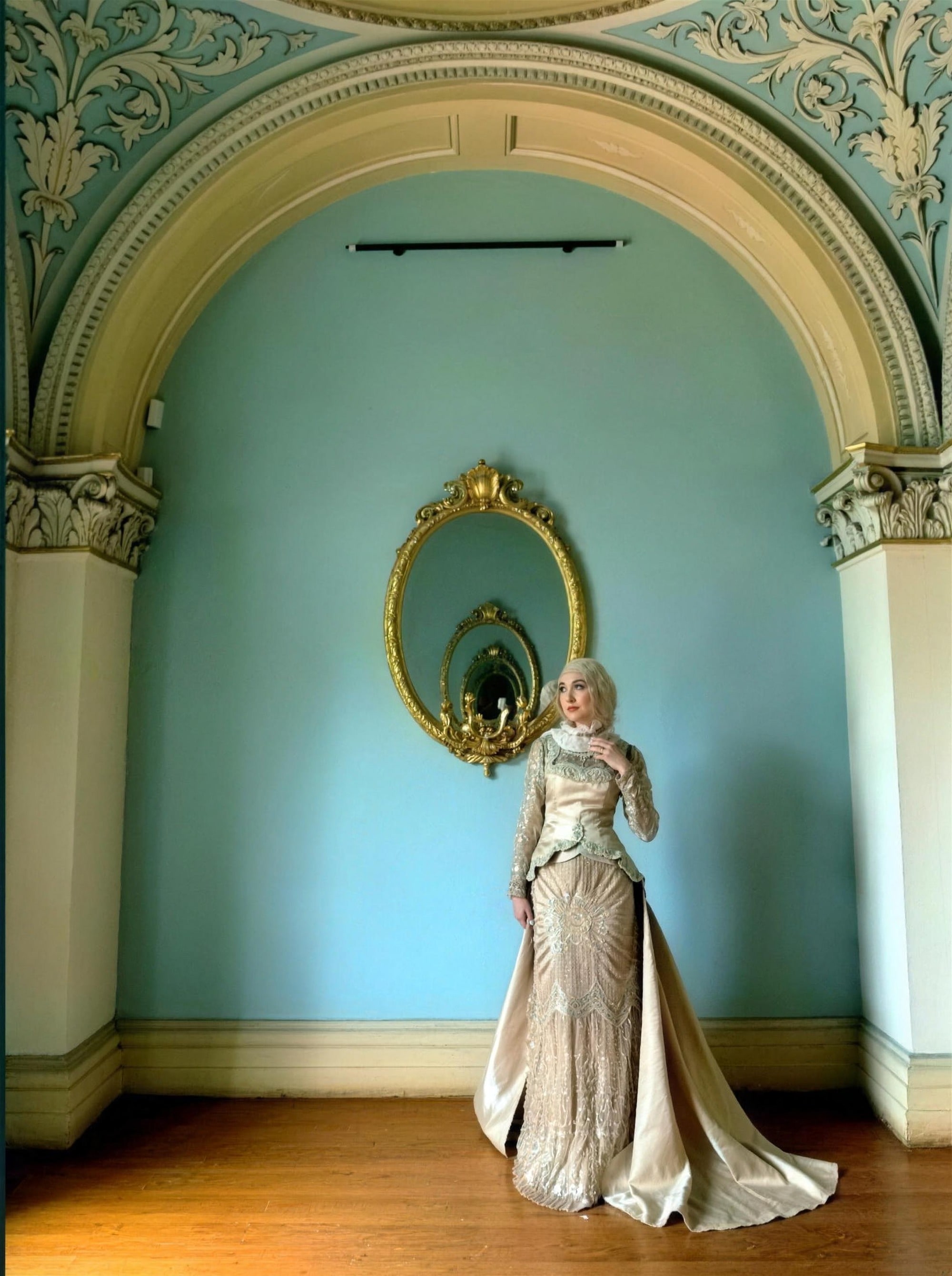 Champagne beaded modest evening gown by RAIÉ Couture