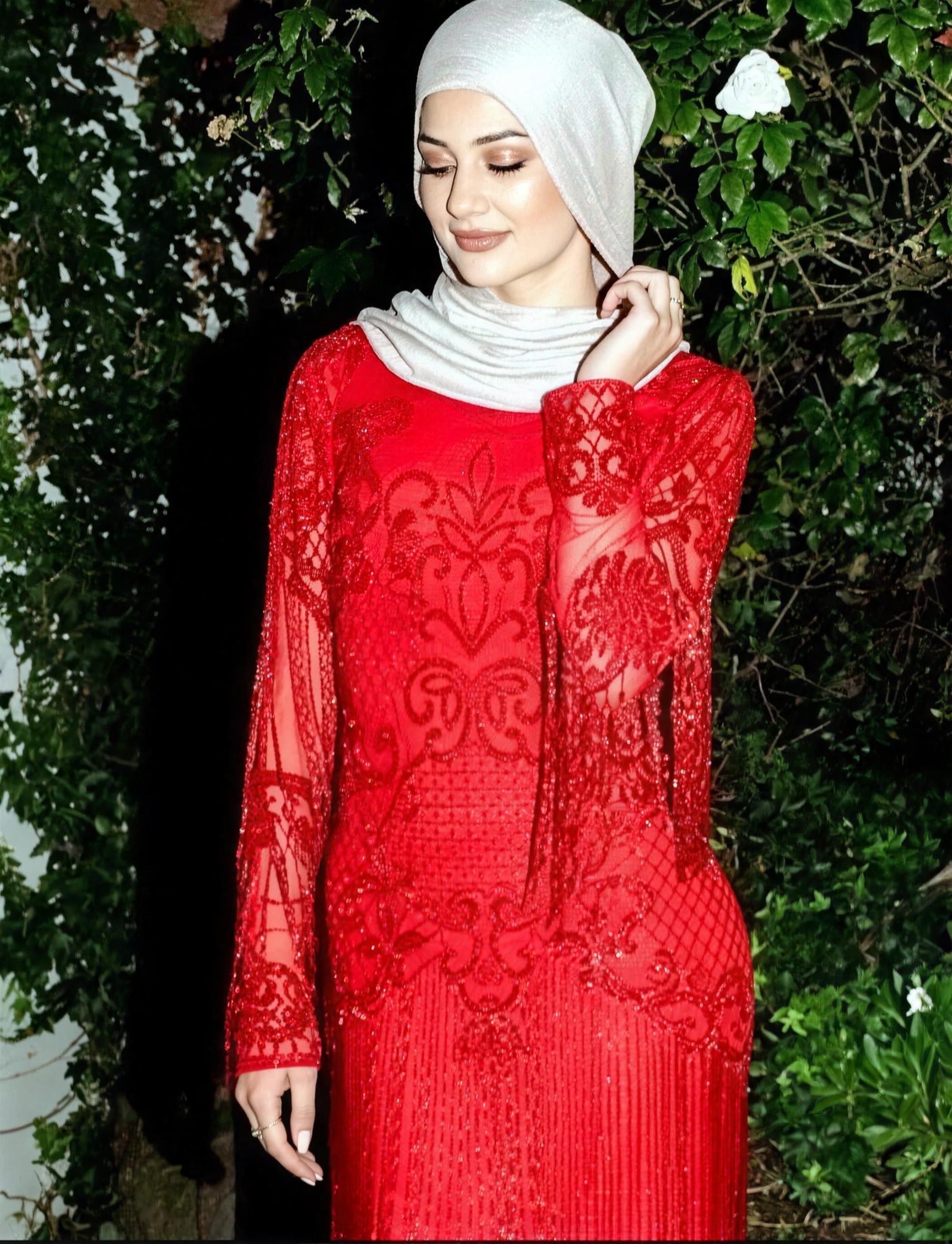 Deep-red beaded modest evening gown by RAIÉ Couture