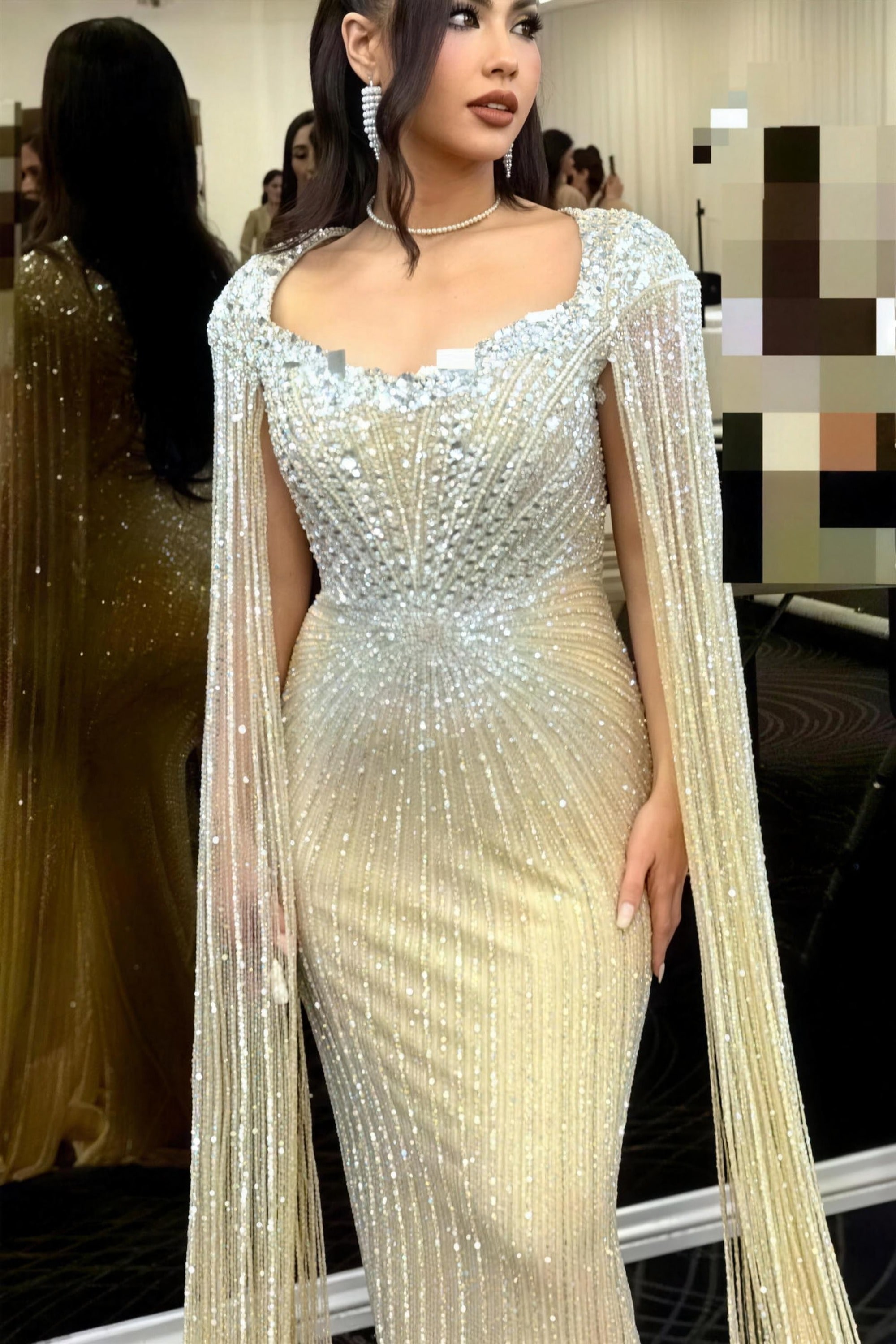 Champagne beaded modest evening gown by RAIÉ Couture