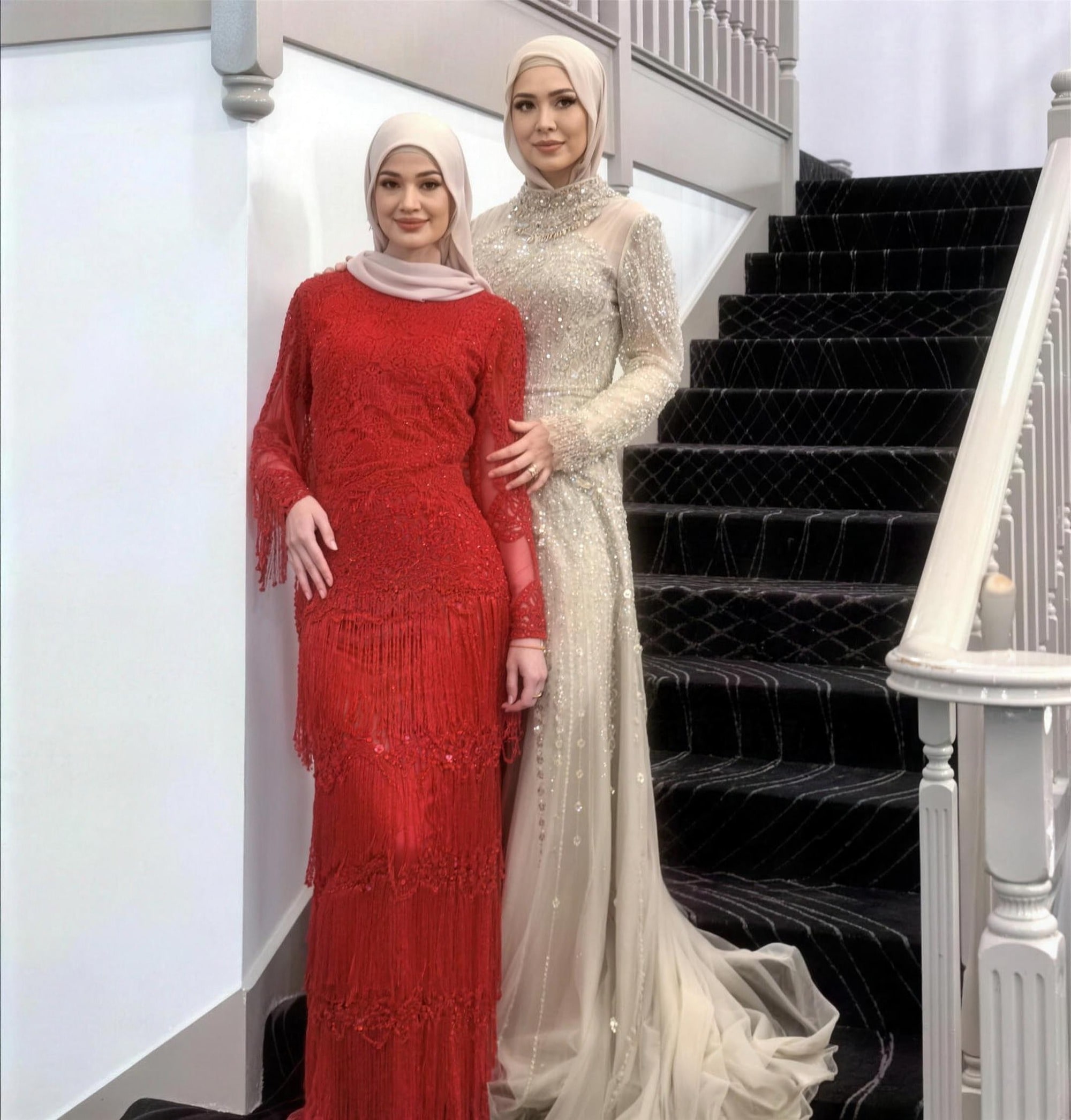 Deep-red beaded modest evening gown by RAIÉ Couture