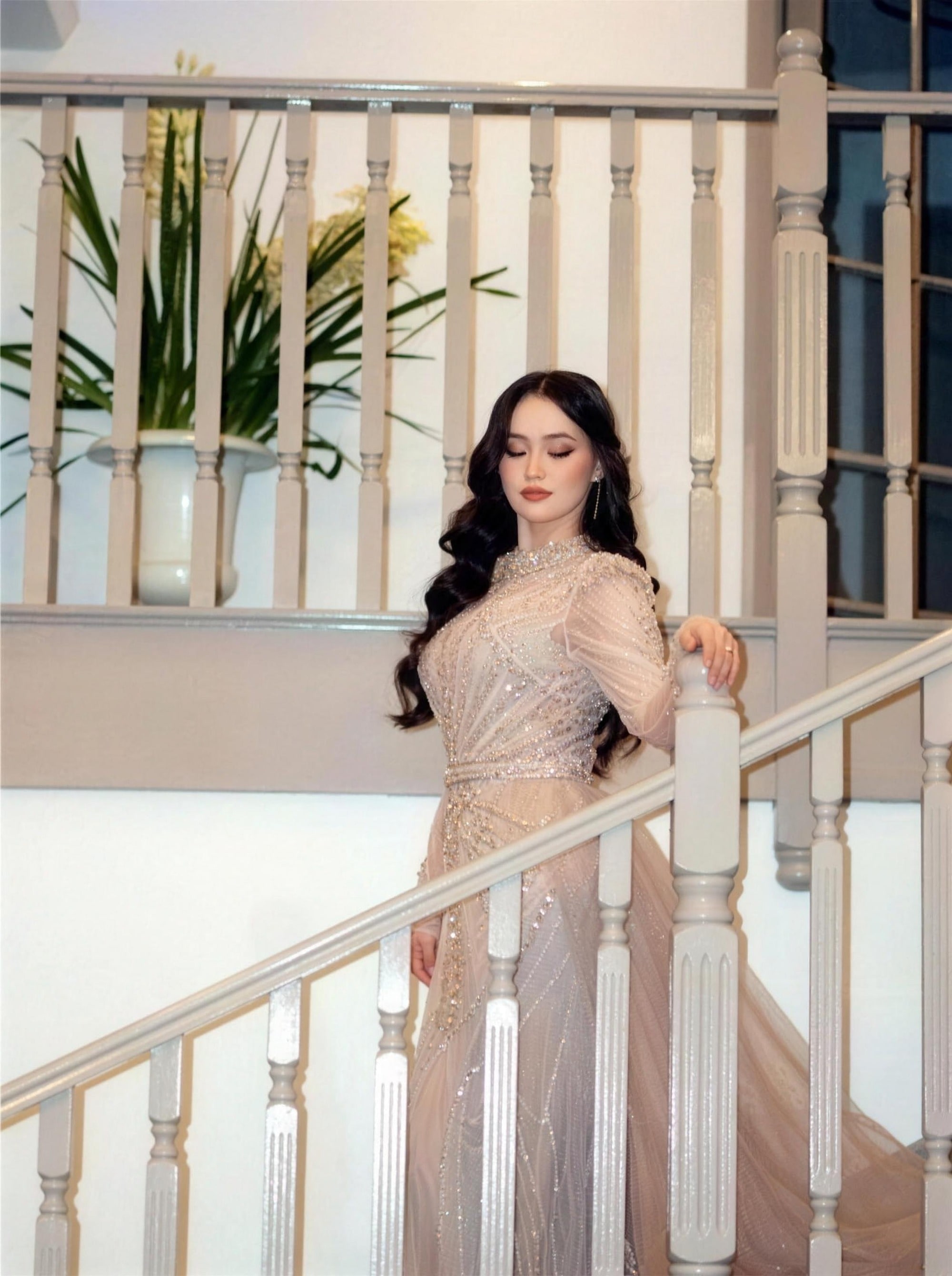Champagne beaded modest evening gown by RAIÉ Couture