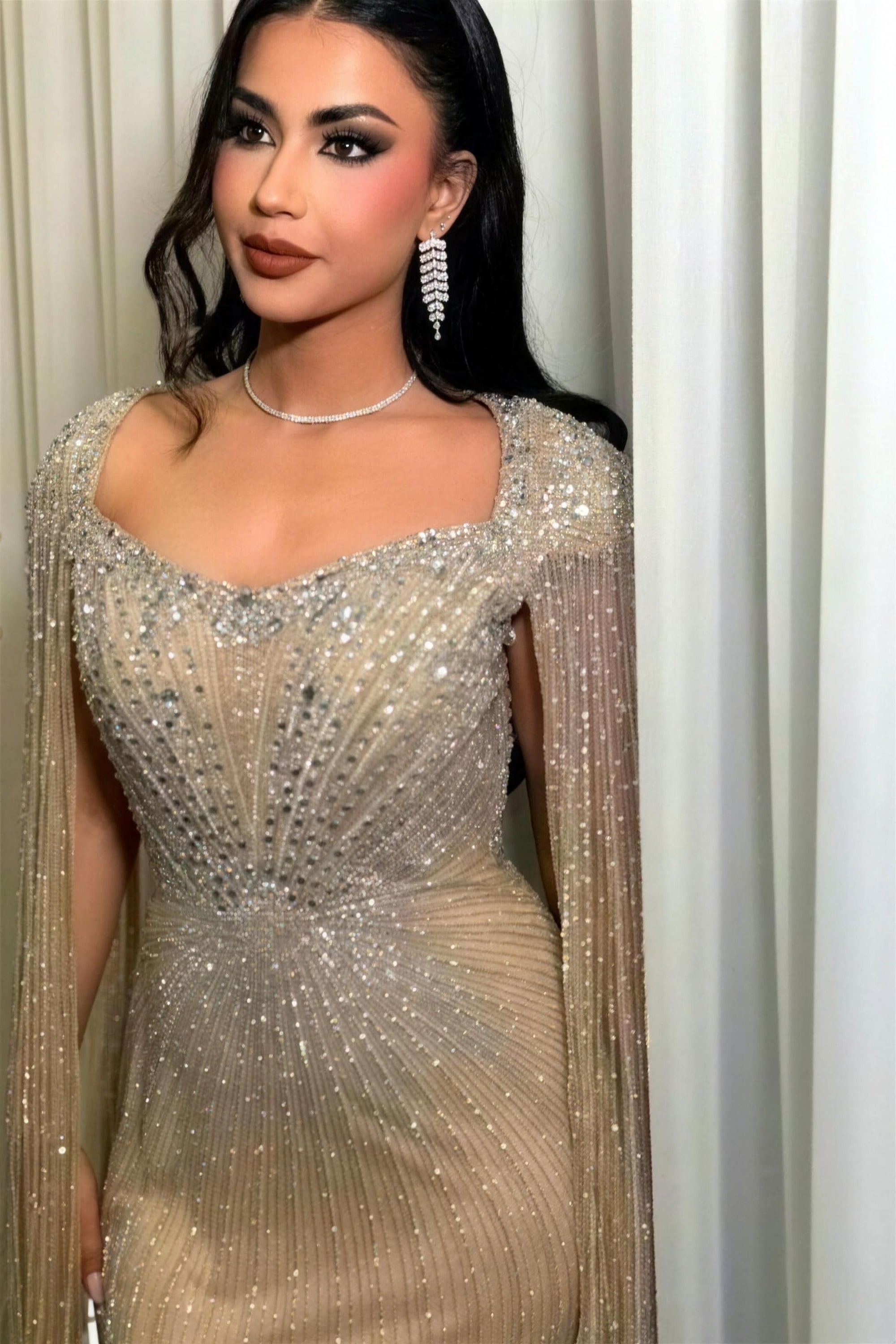 Champagne beaded modest evening gown by RAIÉ Couture