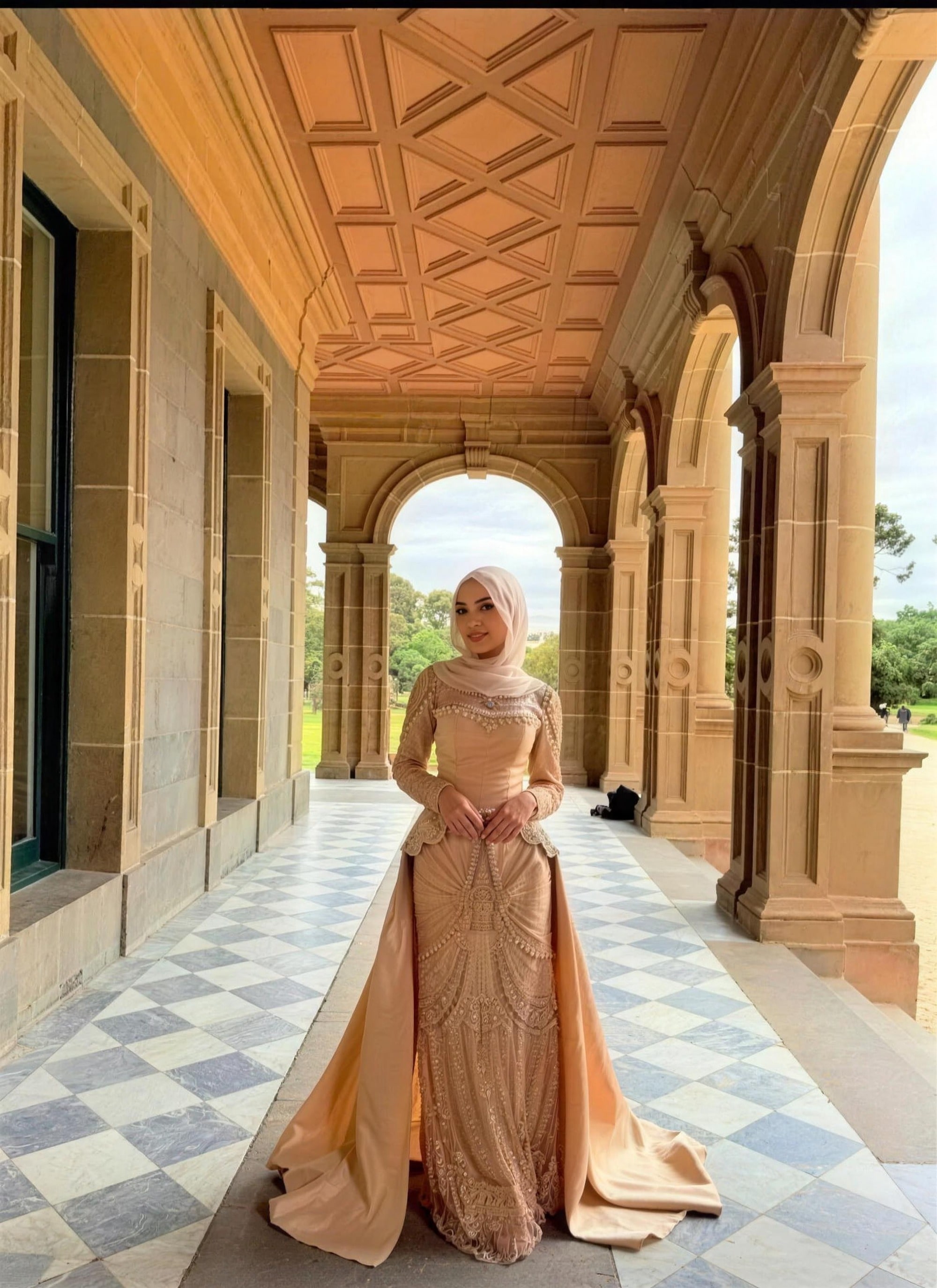 Champagne beaded modest evening gown by RAIÉ Couture